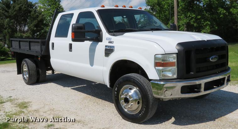 image for item DE8072 2008 Ford F350 Super Duty XL Crew Cab flatbed pickup truck