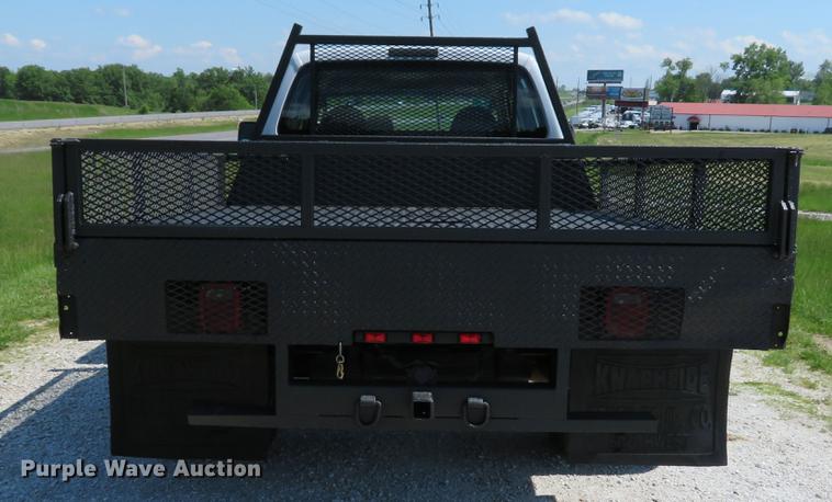 image for item DE8072 2008 Ford F350 Super Duty XL Crew Cab flatbed pickup truck