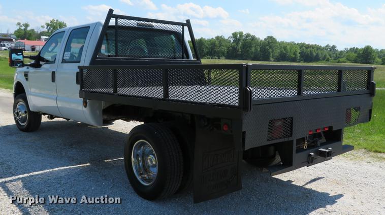 image for item DE8072 2008 Ford F350 Super Duty XL Crew Cab flatbed pickup truck