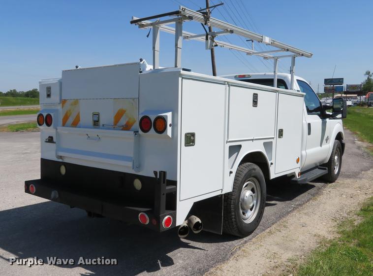 image for item DE8083 2012 Ford F350 Super Duty XL utility bed pickup truck