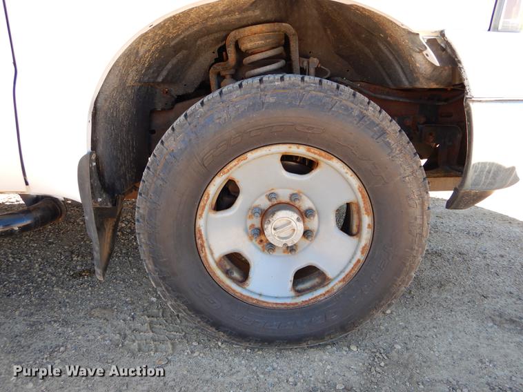 image for item DE8436 2005 Ford F350 Super Duty XL SuperCab utility bed pickup truck