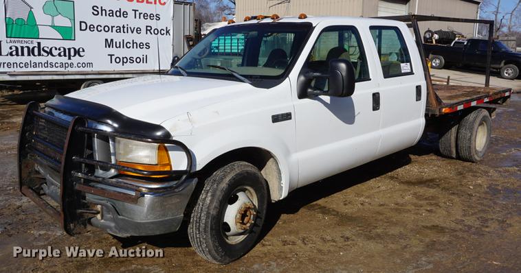 image for item DF7624 1999 Ford F350 Super Duty Crew Cab flatbed pickup truck