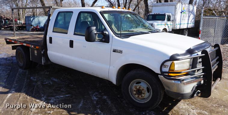 image for item DF7624 1999 Ford F350 Super Duty Crew Cab flatbed pickup truck