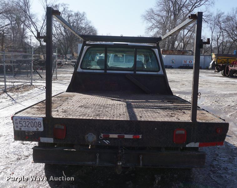 image for item DF7624 1999 Ford F350 Super Duty Crew Cab flatbed pickup truck