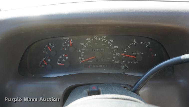 image for item DF7624 1999 Ford F350 Super Duty Crew Cab flatbed pickup truck