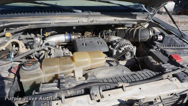 image for item DF7624 1999 Ford F350 Super Duty Crew Cab flatbed pickup truck