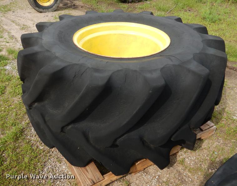 (2) 28L26 tires and wheels in Belton, MO Item DY9813 sold Purple Wave