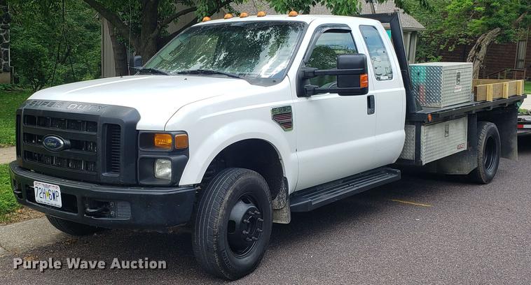 image for item EN9993 2008 Ford F350 Super Duty SuperCab flatbed pickup truck