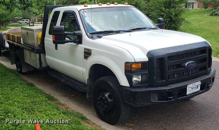 image for item EN9993 2008 Ford F350 Super Duty SuperCab flatbed pickup truck