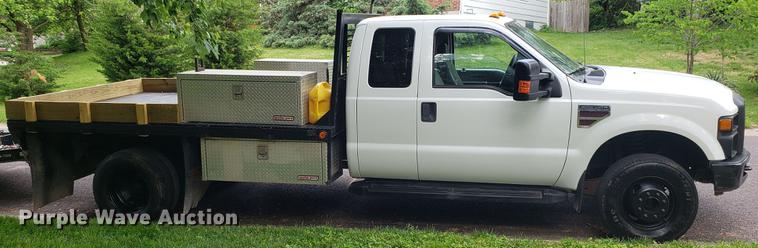 image for item EN9993 2008 Ford F350 Super Duty SuperCab flatbed pickup truck