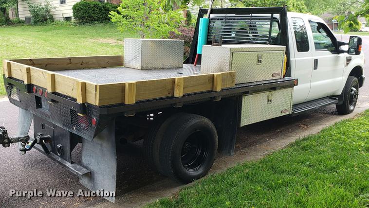 image for item EN9993 2008 Ford F350 Super Duty SuperCab flatbed pickup truck