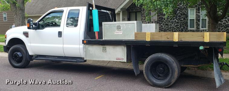 image for item EN9993 2008 Ford F350 Super Duty SuperCab flatbed pickup truck
