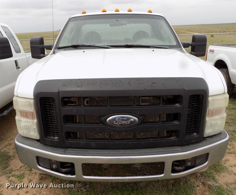 image for item FG9438 2009 Ford F350 Super Duty XL flatbed pickup truck