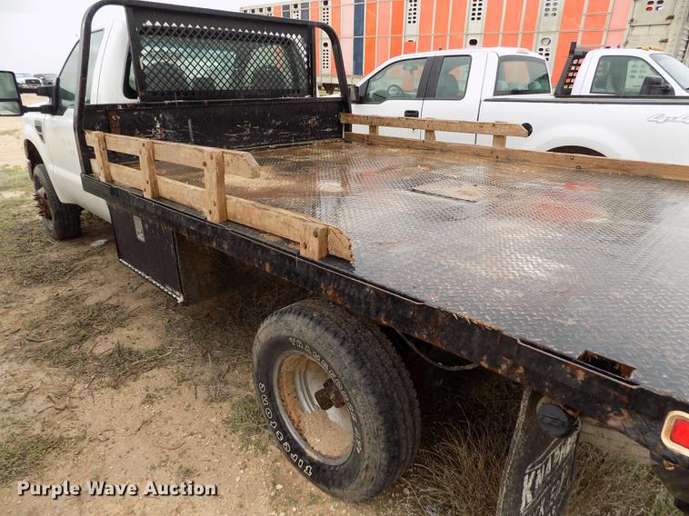 image for item FG9448 2009 Ford F350 Super Duty XL flatbed pickup truck