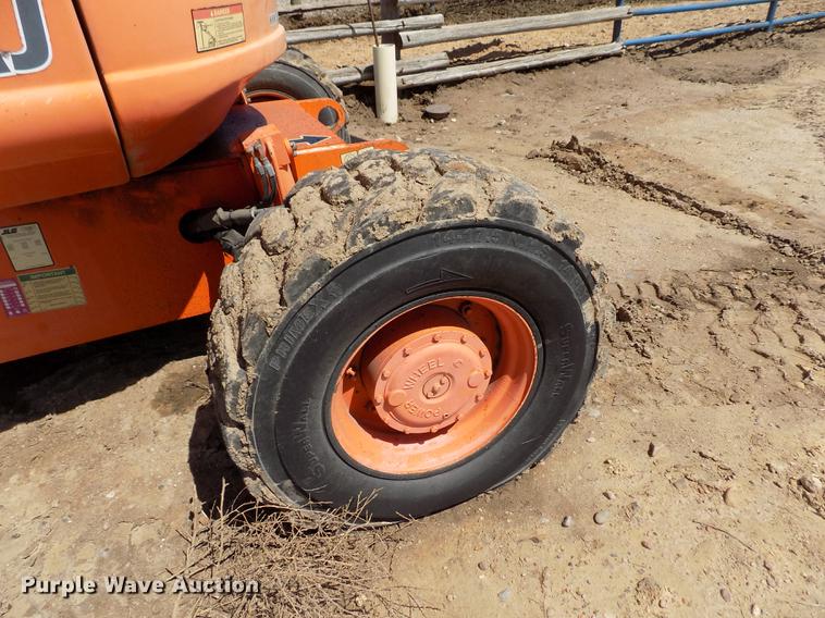 image for item FG9492 1999 JLG 600AJ boom lift