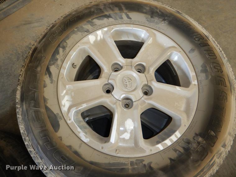 image for item FQ9803 (4) Bridgestone 275/65R18 tires and wheels