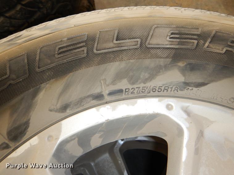 image for item FQ9803 (4) Bridgestone 275/65R18 tires and wheels