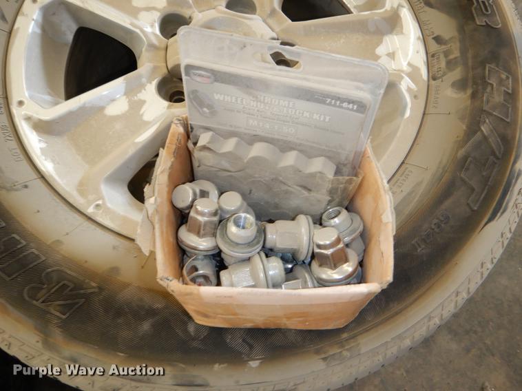 image for item FQ9803 (4) Bridgestone 275/65R18 tires and wheels