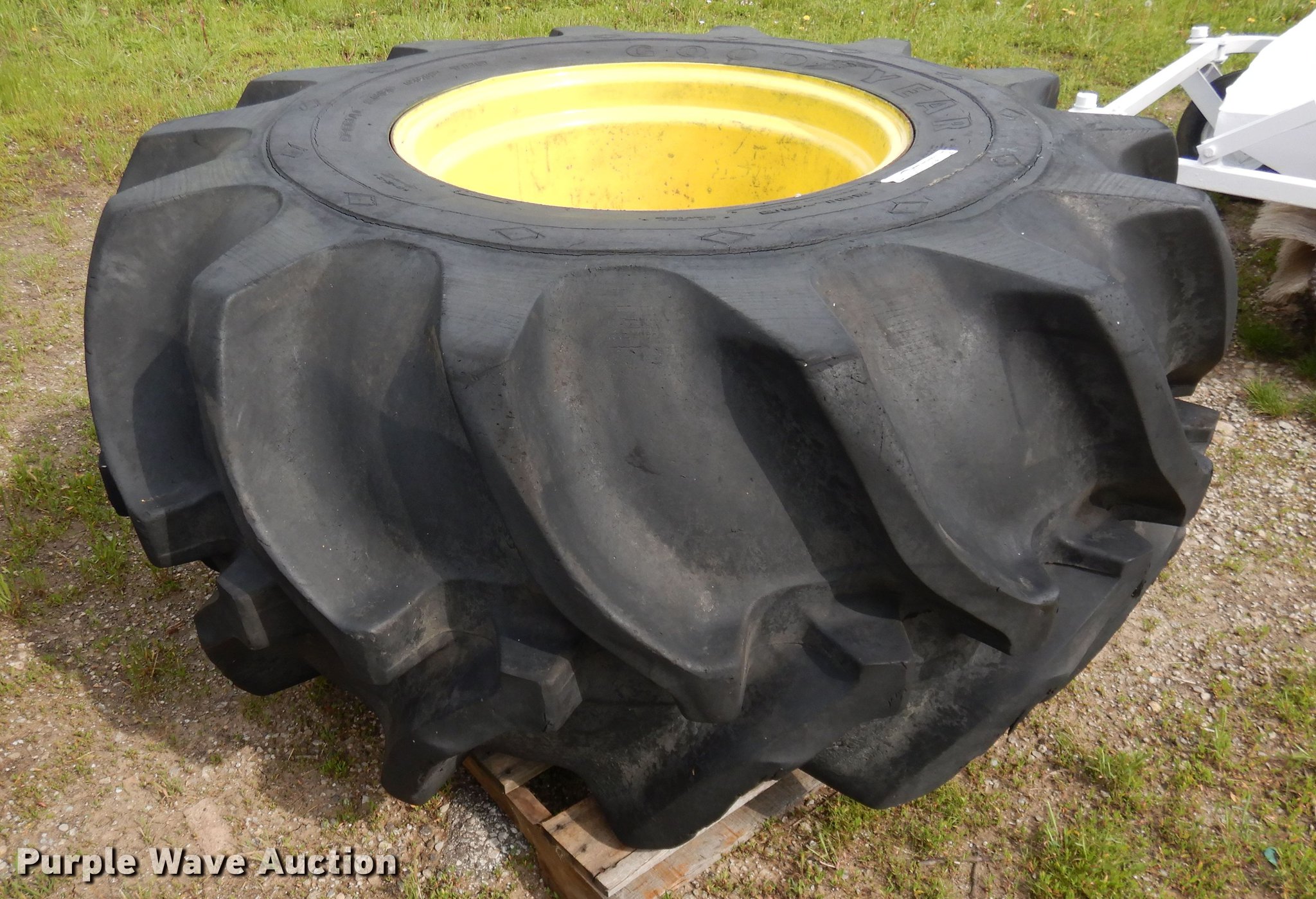 (2) 28L26 tires and wheels in Belton, MO Item DY9813 sold Purple Wave