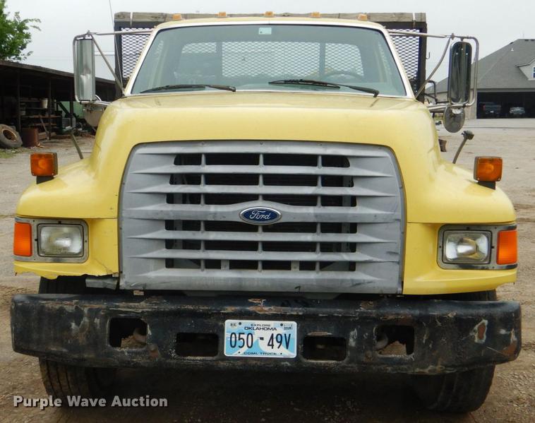 image for item DE3954 1998 Ford F700 dump flatbed truck