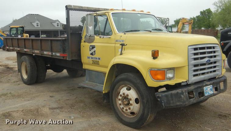 image for item DE3954 1998 Ford F700 dump flatbed truck