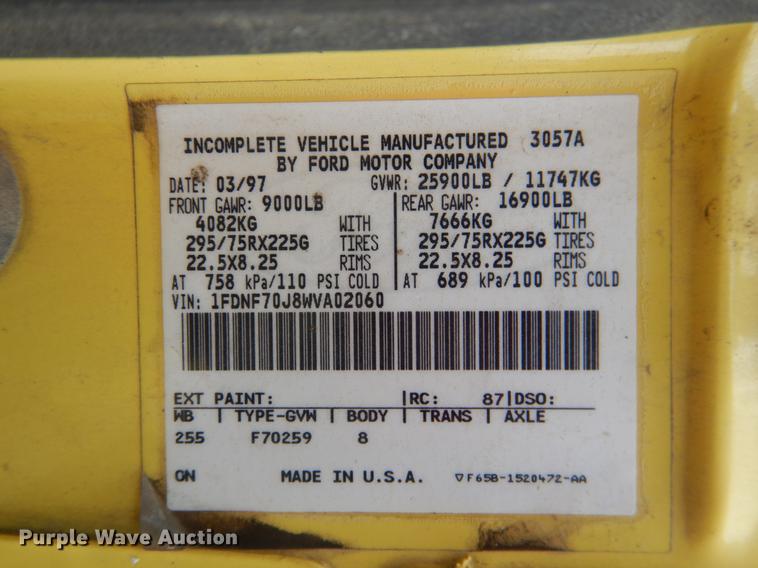 image for item DE3954 1998 Ford F700 dump flatbed truck