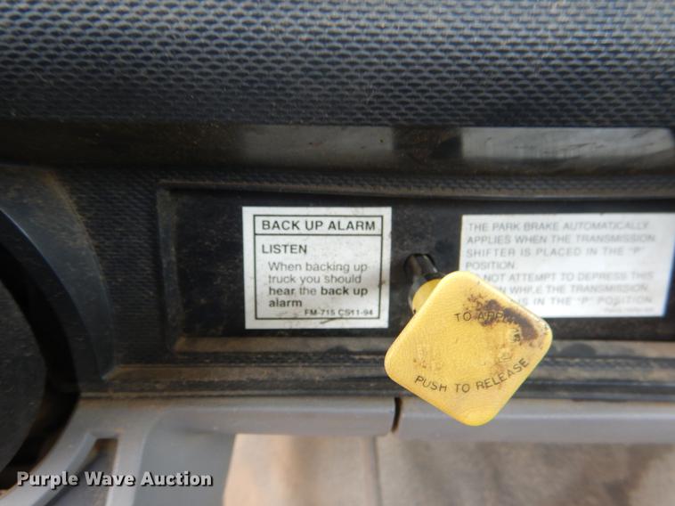 image for item DE3954 1998 Ford F700 dump flatbed truck