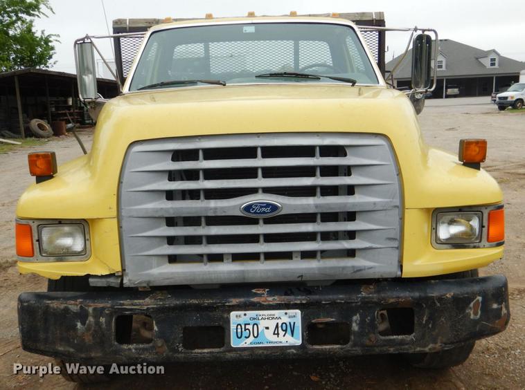 image for item DE3954 1998 Ford F700 dump flatbed truck