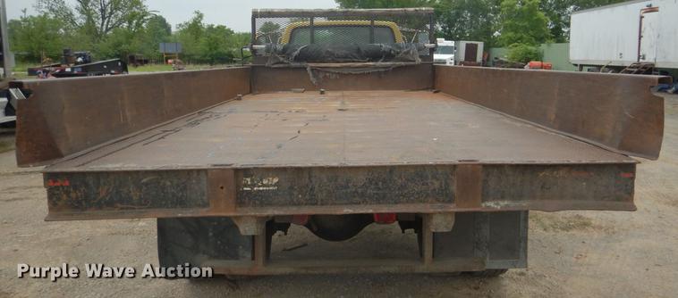 image for item DE3954 1998 Ford F700 dump flatbed truck