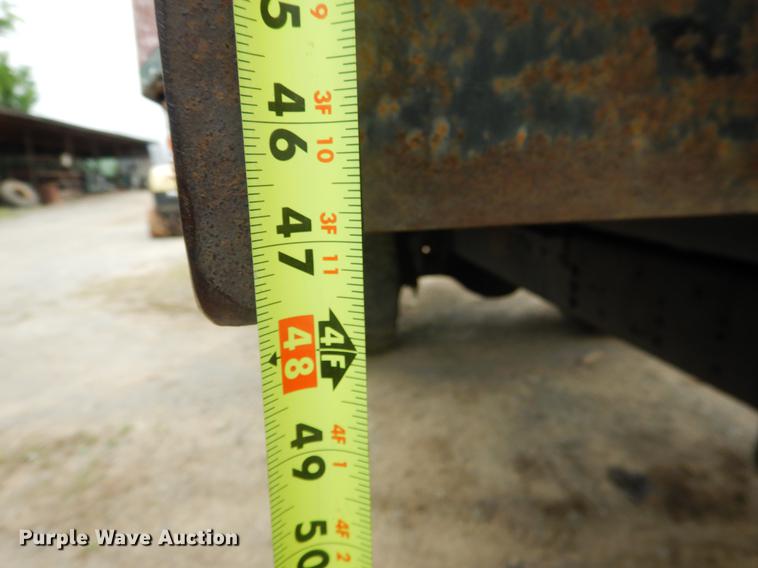 image for item DE3954 1998 Ford F700 dump flatbed truck