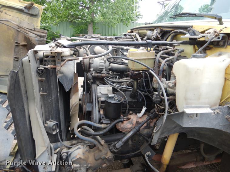 image for item DE3954 1998 Ford F700 dump flatbed truck