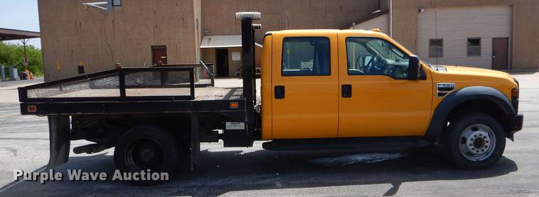 image for item DE8428 2008 Ford F550 Super Duty XL Crew Cab flatbed truck