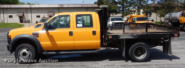 image for item DE8428 2008 Ford F550 Super Duty XL Crew Cab flatbed truck