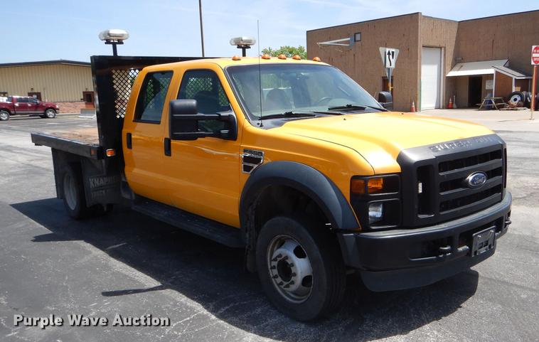 image for item DE8429 2008 Ford F550 Super Duty XL Crew Cab flatbed truck
