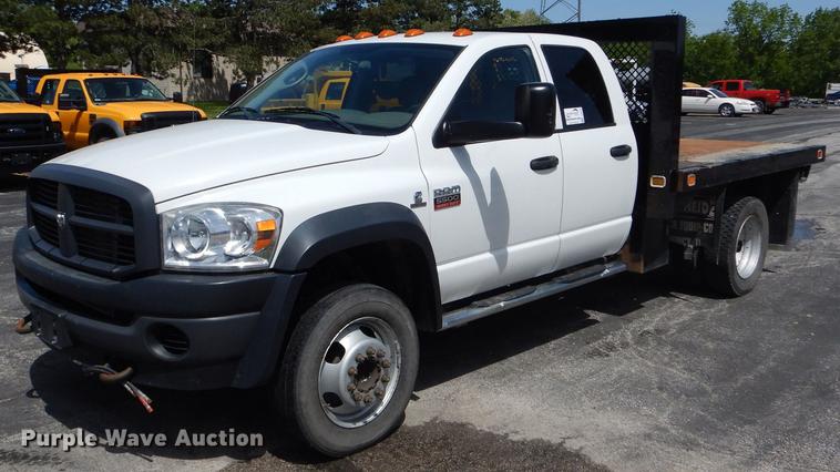 image for item DE8432 2009 Dodge Ram 5500HD Quad Cab flatbed truck