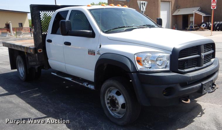 image for item DE8432 2009 Dodge Ram 5500HD Quad Cab flatbed truck