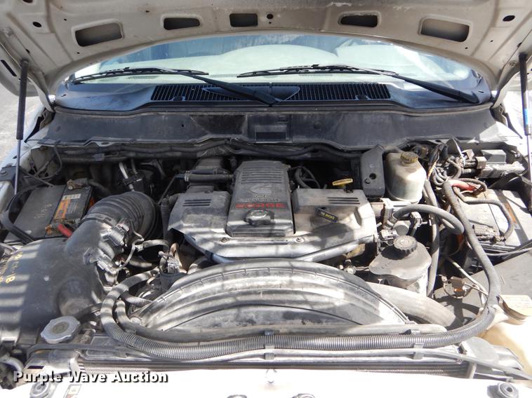 image for item DE8432 2009 Dodge Ram 5500HD Quad Cab flatbed truck