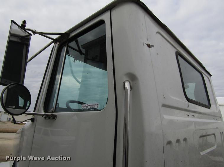 image for item EU9599 1996 Volvo WG roll off container truck