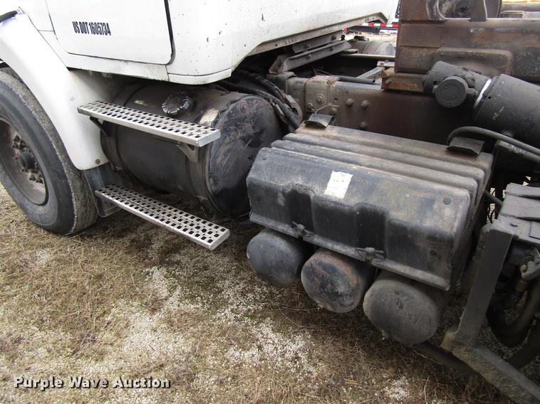 image for item EU9599 1996 Volvo WG roll off container truck