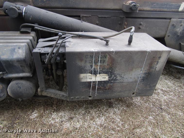 image for item EU9599 1996 Volvo WG roll off container truck