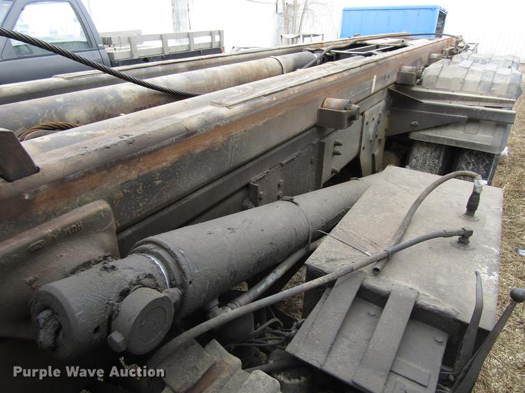 image for item EU9599 1996 Volvo WG roll off container truck