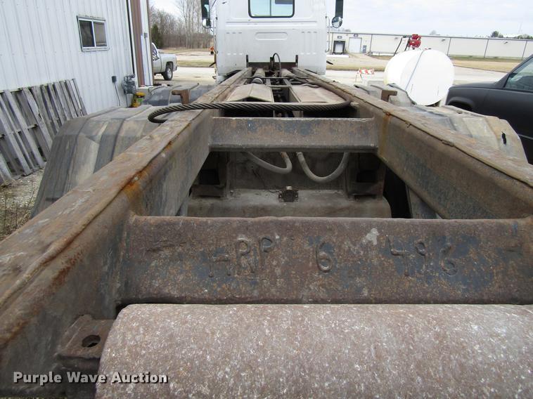 image for item EU9599 1996 Volvo WG roll off container truck