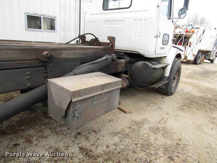 image for item EU9599 1996 Volvo WG roll off container truck