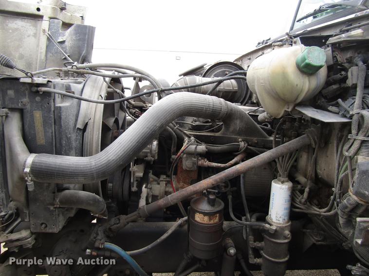 image for item EU9599 1996 Volvo WG roll off container truck