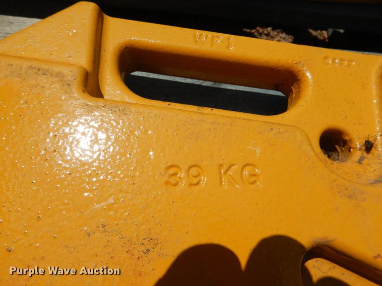 image for item FA9282 John Deere skid steer counterweights