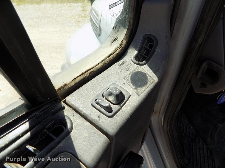 image for item DE1179 2004 Freightliner Business Class M2 hay bale stacker truck