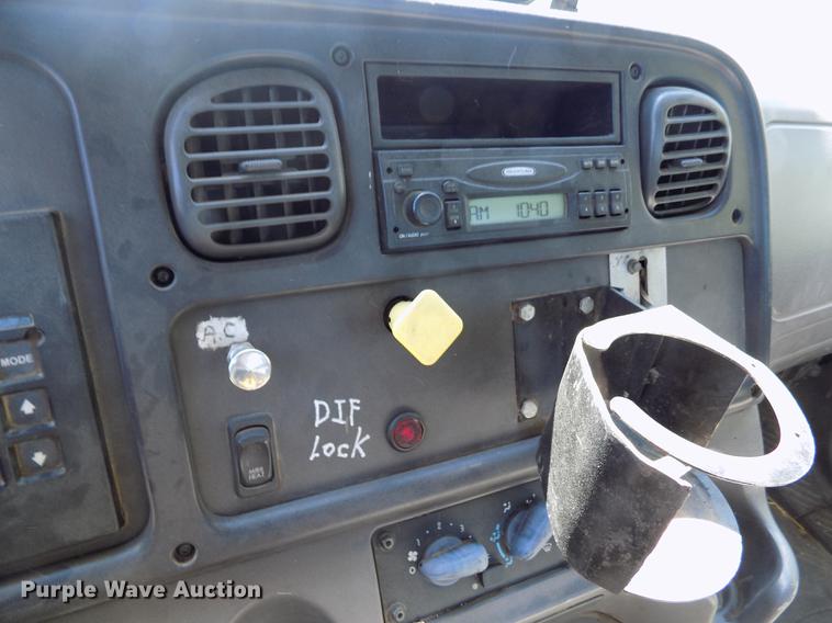 image for item DE1179 2004 Freightliner Business Class M2 hay bale stacker truck