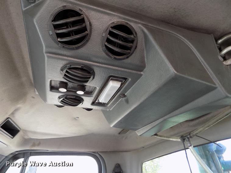 image for item DE1179 2004 Freightliner Business Class M2 hay bale stacker truck