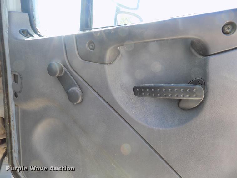 image for item DE1179 2004 Freightliner Business Class M2 hay bale stacker truck