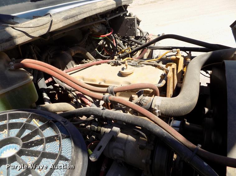 image for item DE1179 2004 Freightliner Business Class M2 hay bale stacker truck